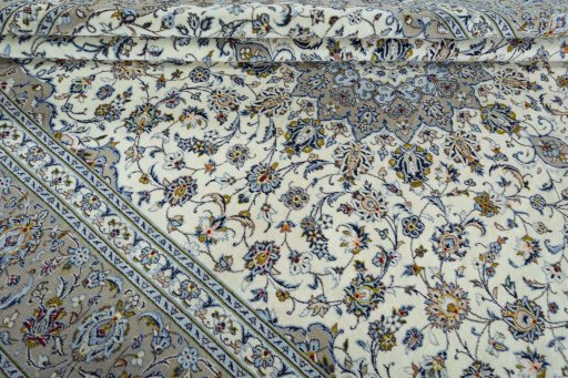 Close-up detail of 2000s Kashan rug from Iran / Persia showing Wool weave