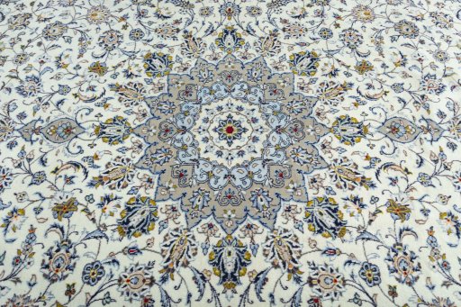 Central medallion detail of 2000s Kashan rug from Iran / Persia