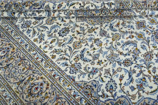 Close-up detail of 2000s Kashan rug from Iran / Persia showing Wool weave