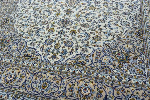 Close-up detail of 2000s Kashan rug from Iran / Persia showing Wool weave