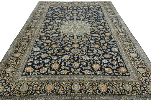 Surface texture of 2000s Kashan rug with natural Wool and intricate pattern