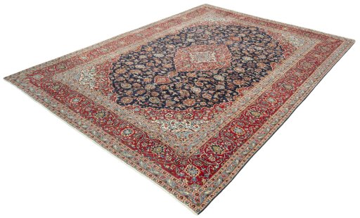 Corner detail of 2000s Kashan rug showing border pattern and Wool pile