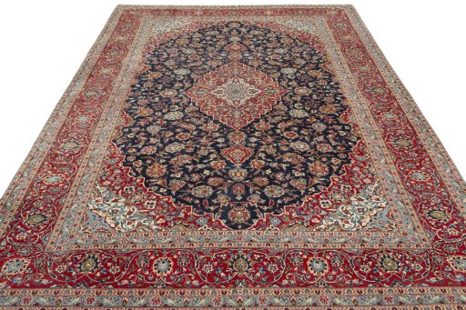 Surface texture of 2000s Kashan rug with natural Wool and intricate pattern
