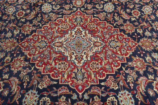 Central medallion detail of 2000s Kashan rug from Iran / Persia