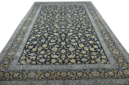 Surface texture of 2000s Kashan rug with natural Wool and intricate pattern