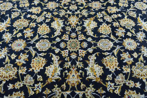 Central medallion detail of 2000s Kashan rug from Iran / Persia