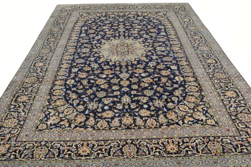 Surface texture of 2000s Kashan rug with natural Wool and intricate pattern