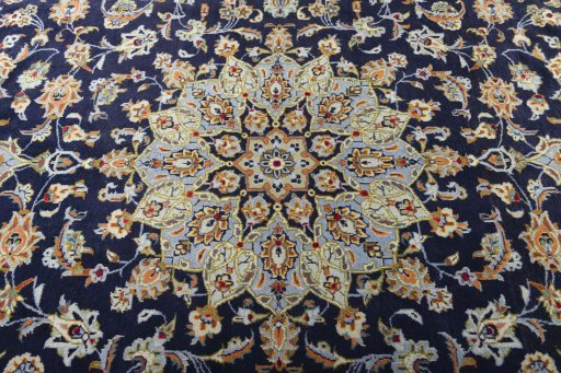 Central medallion detail of 2000s Kashan rug from Iran / Persia