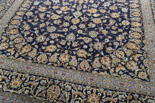 Close-up detail of 2000s Kashan rug from Iran / Persia showing Wool weave