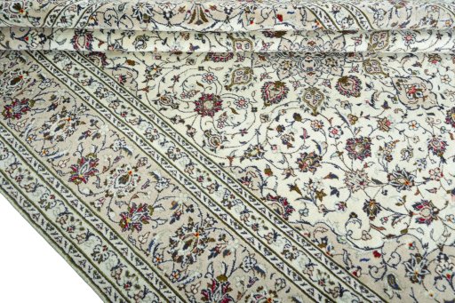 Close-up detail of 2000s Kashan rug from Iran / Persia showing Wool weave
