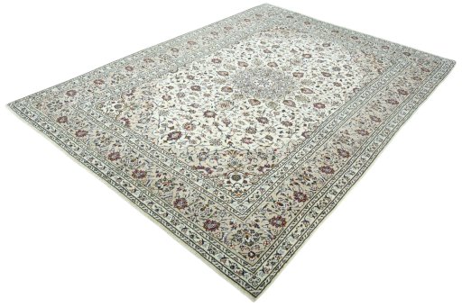 Corner detail of 2000s Kashan rug showing border pattern and Wool pile