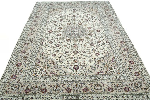 Surface texture of 2000s Kashan rug with natural Wool and intricate pattern