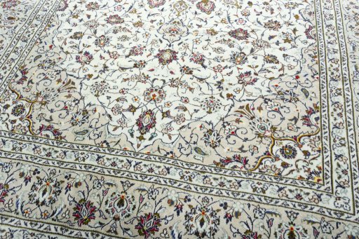 Close-up detail of 2000s Kashan rug from Iran / Persia showing Wool weave