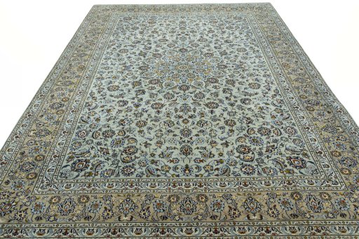 Surface texture of 2000s Kashan rug with natural Wool and intricate pattern