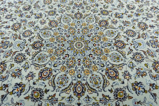Central medallion detail of 2000s Kashan rug from Iran / Persia