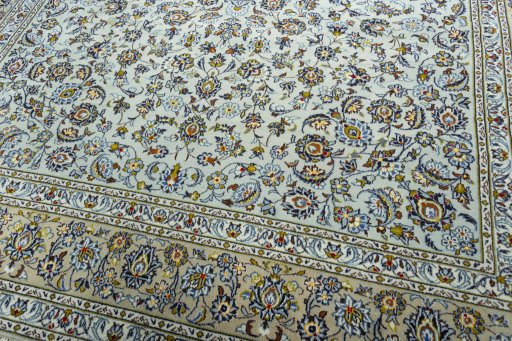 Close-up detail of 2000s Kashan rug from Iran / Persia showing Wool weave