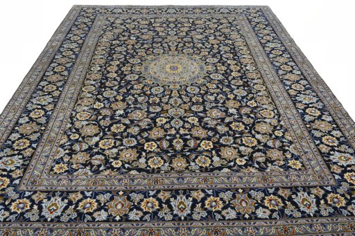 Surface texture of 2000s Kashan rug with natural Wool and intricate pattern