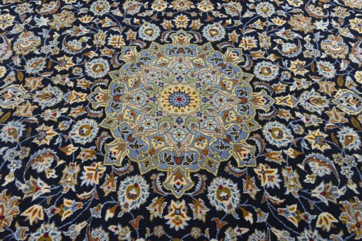 Central medallion detail of 2000s Kashan rug from Iran / Persia