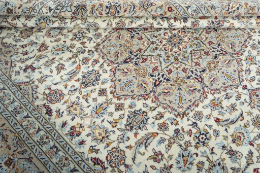 Close-up detail of 2000s Kashan rug from Iran / Persia showing Wool weave