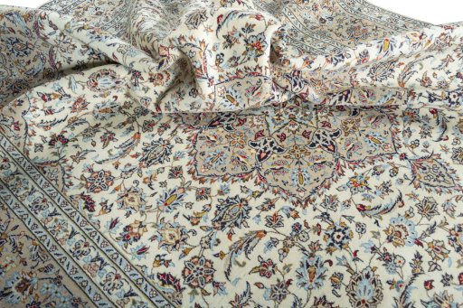 Surface texture of 2000s Kashan rug with natural Wool and intricate pattern
