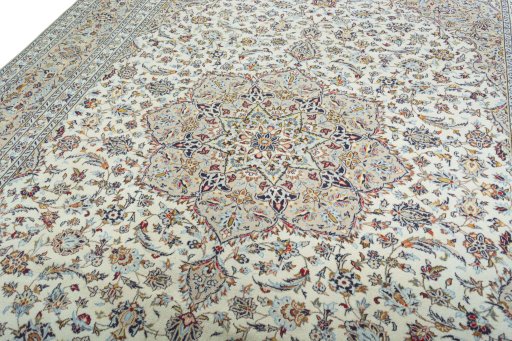 Backside of handmade 2000s Kashan rug showing knot structure and weave density