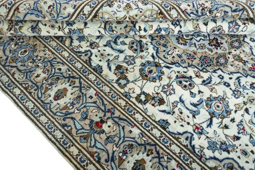 Close-up detail of 2000s Kashan rug from Iran / Persia showing Wool weave