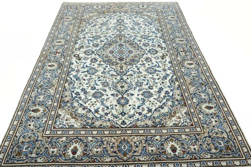 Surface texture of 2000s Kashan rug with natural Wool and intricate pattern