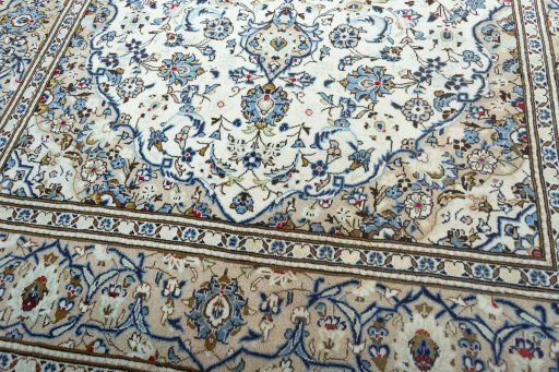 Close-up detail of 2000s Kashan rug from Iran / Persia showing Wool weave