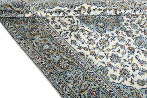 Close-up detail of 2000s Kashan rug from Iran / Persia showing Wool weave
