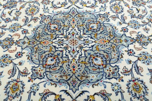 Central medallion detail of 2000s Kashan rug from Iran / Persia