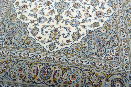 Close-up detail of 2000s Kashan rug from Iran / Persia showing Wool weave
