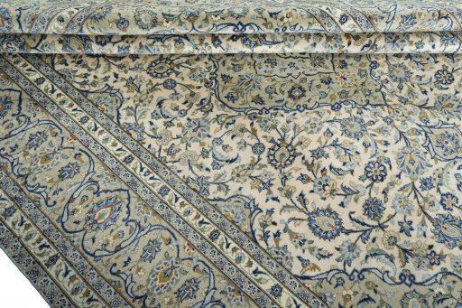 Close-up detail of 2000s Kashan rug from Iran / Persia showing Wool weave