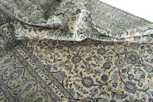 Surface texture of 2000s Kashan rug with natural Wool and intricate pattern