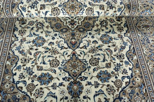 Close-up detail of 2000s Kashan rug from Iran / Persia showing Wool weave
