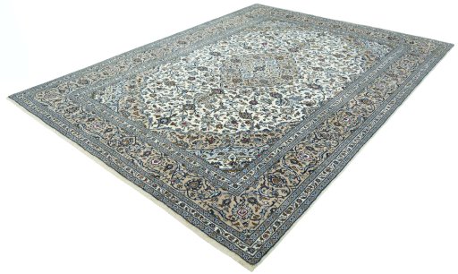 Corner detail of 2000s Kashan rug showing border pattern and Wool pile
