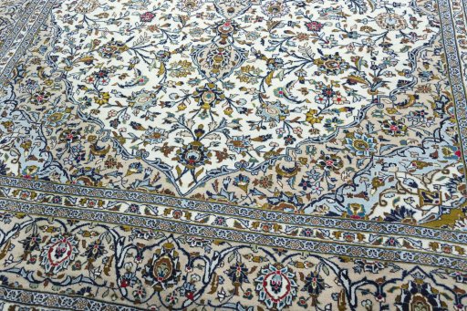 Close-up detail of 2000s Kashan rug from Iran / Persia showing Wool weave