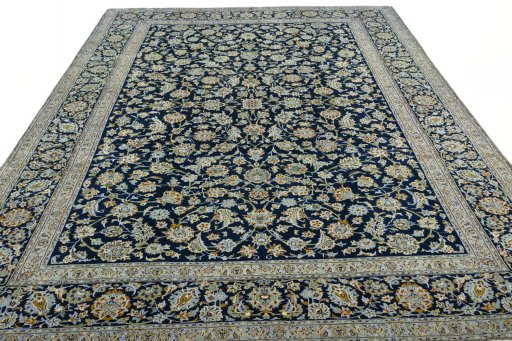 Surface texture of 2000s Kashan rug with natural Wool and intricate pattern