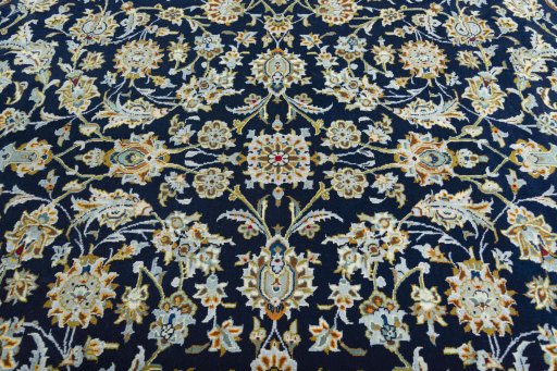 Central medallion detail of 2000s Kashan rug from Iran / Persia