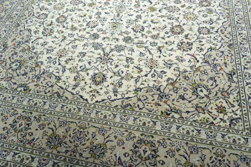 Close-up detail of 2000s Kashan rug from Iran / Persia showing Wool weave