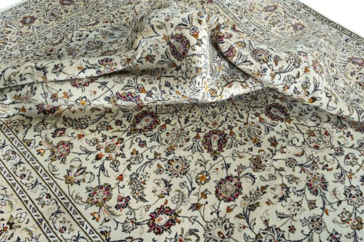 Surface texture of 2000s Kashan rug with natural Wool and intricate pattern