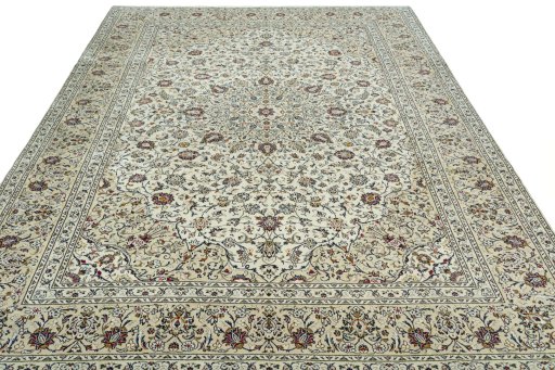 Surface texture of 2000s Kashan rug with natural Wool and intricate pattern