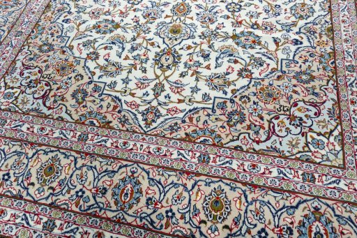 Close-up detail of 2000s Kashan rug from Iran / Persia showing Wool weave