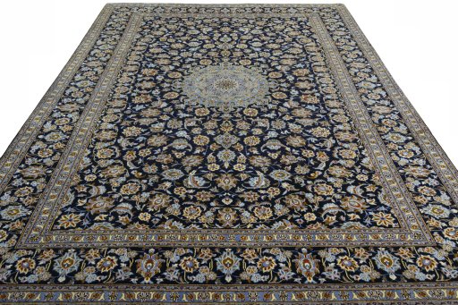 Surface texture of 2000s Kashan rug with natural Wool and intricate pattern