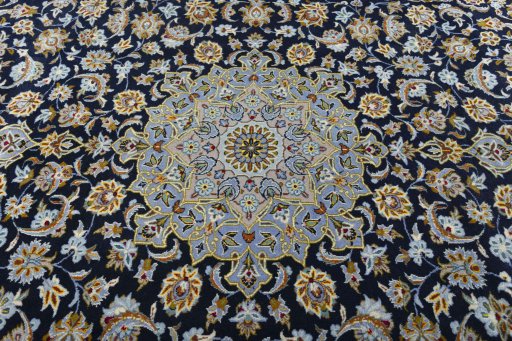 Central medallion detail of 2000s Kashan rug from Iran / Persia