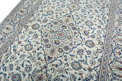 Backside of handmade 2000s Kashan rug showing knot structure and weave density