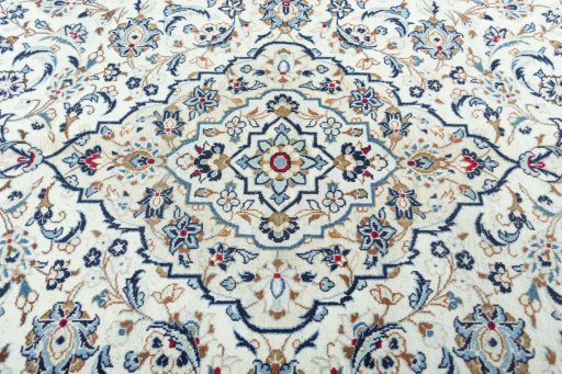 Central medallion detail of 2000s Kashan rug from Iran / Persia