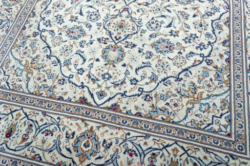 Close-up detail of 2000s Kashan rug from Iran / Persia showing Wool weave
