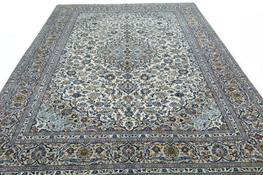 Surface texture of 2000s Kashan rug with natural Wool and intricate pattern