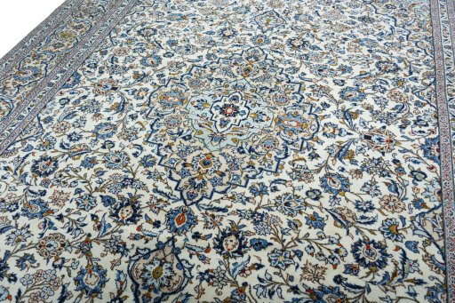 Backside of handmade 2000s Kashan rug showing knot structure and weave density