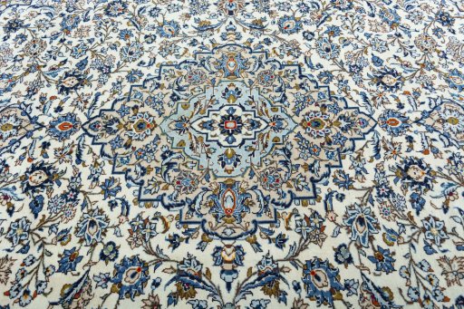 Central medallion detail of 2000s Kashan rug from Iran / Persia